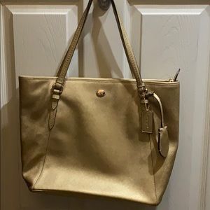Antique gold Coach shoulder bag.